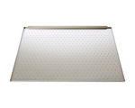 Rectangular metal sheet with holes on a white background