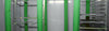 Green insulated curtains on a metal rack system in a industrial setting