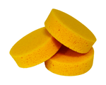 Three yellow sponges stacked on a white background