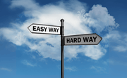 Easy Way or Hard Way road signs with lue sky background with cloud
