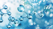 Molecular structure with water droplets against a blurred blue background