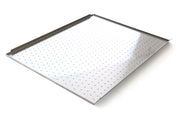 Metal curing tray with perforated design on a white background