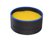 Yellow sponge in a black container with blue rim on a white background